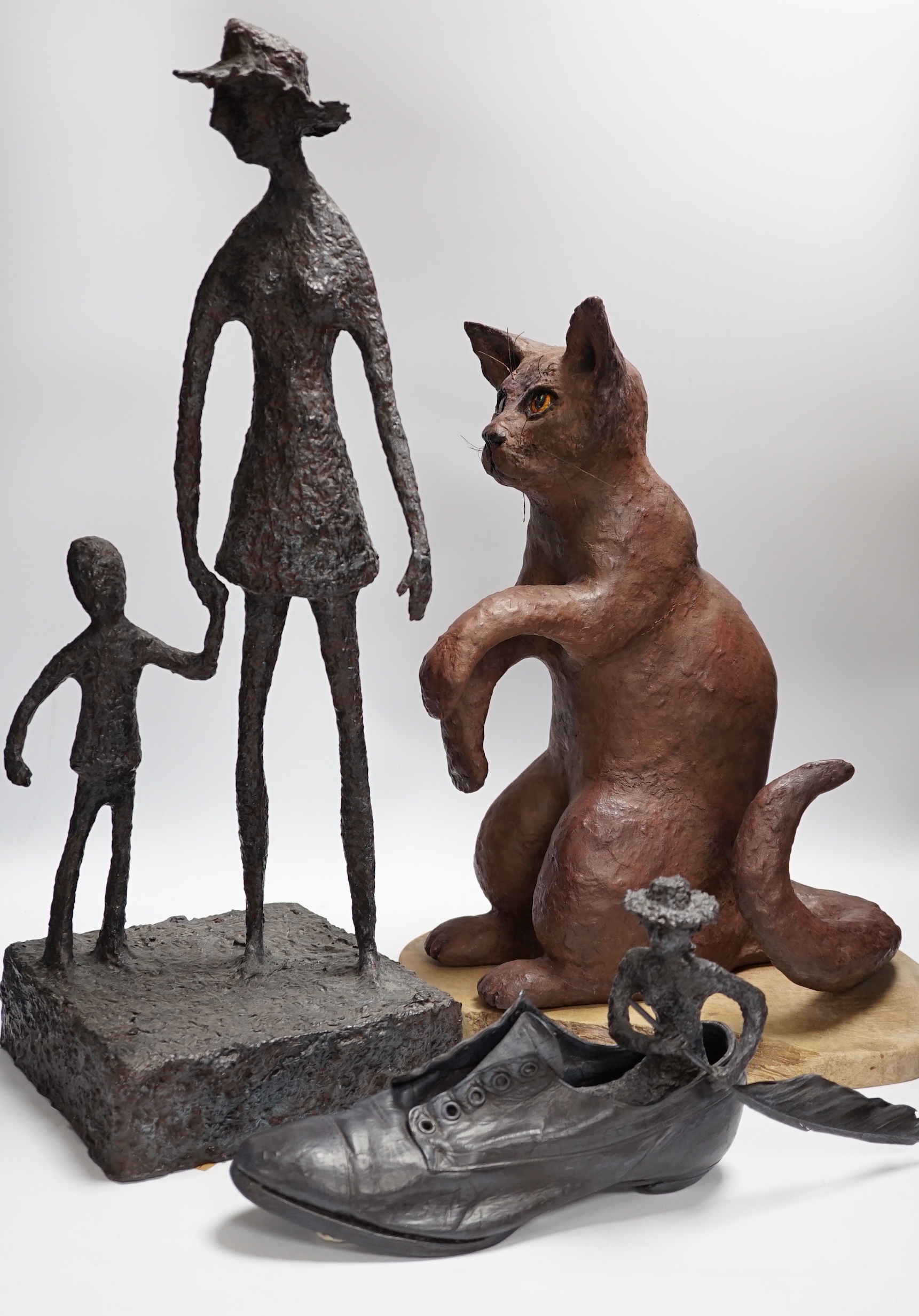 Three mixed media novelty statues, tallest 55cm high